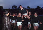 Springbok captain Morne Du Plessis is carried from the field following his side's victory in the third Test against the British Lions at Boet Erasmus Stadium in Port Elizabeth on June 28 1980.