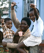 A defiant Ntsiki Biko with Samora (left) and Nkosinathi at their Ginsberg home after Steve Biko's death in 1977.