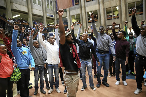 Wits students gather as part of the #FeesMustFall movement in September 2016. / ALON SKUY