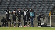 Tshegofatso Mabasa of Orlando Pirates celebrates a goal with teammates during the DStv Premiership match between Orlando Pirates and Black Leopards at Orlando Stadium on May 6 2021.