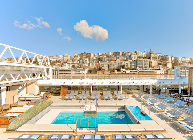 In sunny weather, the roof over the main pool on Viking Star can be opened to let the sun shine.