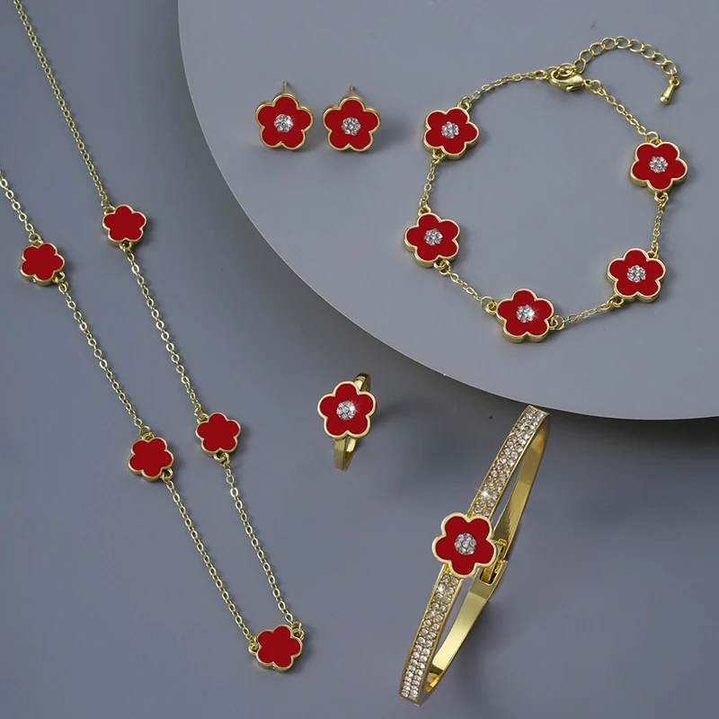 Ensemble Collier et Boucles d'Oreilles Fleur à Cinq Pétales Bijoux Européens et Américains Ornements Floraux pour un Style Raffiné