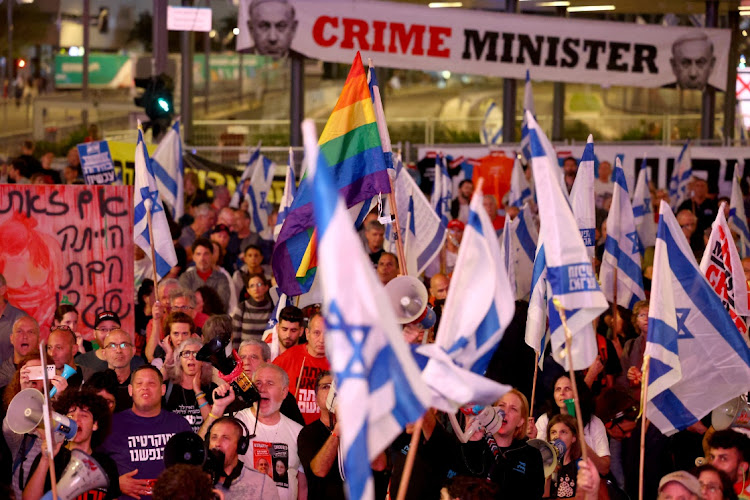 People attend a protest against Israeli Prime Minister Benjamin Netanyahu's government and to call for the release of hostages kidnapped in the deadly October 7 attack on Israel by the Palestinian Islamist group Hamas from Gaza, in Tel Aviv, Israel, April 20. Picture: REUTERS/TPX IMAGES OF THE DAY/HANNAH MCKAY