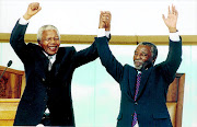 NOT TARDY: Outgoing president Nelson Mandela and Thabo Mbeki at Mbeki's presidential inauguration  Photo: Trevor Samson