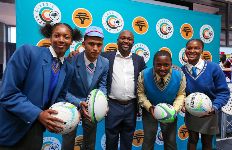 At the launch of the FNB Classic Clashes Festival Eastern Cape at the Nelson Mandela Bay Stadium last week were, from left, Kuhlekwethu Mtimkulu, 18, from Gelvandale High School, Waylon Adams, 19, from Asherville Secondary, Unathi Billie, sales head FNB Business Eastern Cape, Inganathi Mamkeli, 16, from Mzontsundu Secondary and Vuyisani Booi,17, from Molly Blackburn Secondary