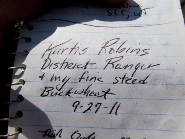 Forest Service ranger's entry in the summit register