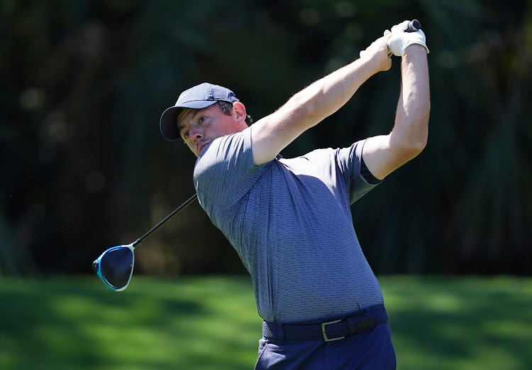 Rory McIlroy hits his tee shot on the 7th hole during the first round of The Players Championship golf tournament