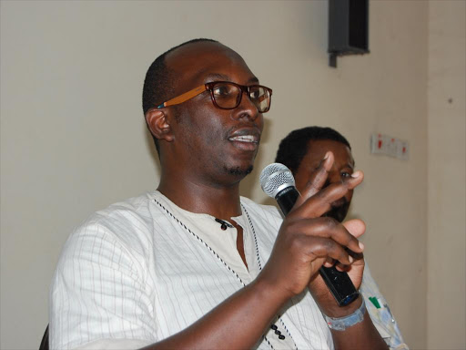 Head of ICTJ Kenya offi ce Chris Gitari addresses participants at a Garissa hotel on Friday /STEPHEN ASTARIKO