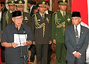 Muhammad Suharto on the left.