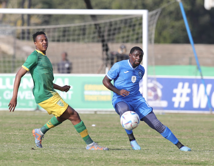Lucky Mohomi of Richards Bay challenged by Sazi Gumbi of Golden Arrows during the 2023 KZN Premiers Cup Semifinal 1 match between Golden Arrows and Richards Bay at Princess Magogo Stadium in Durban on 23 July 2023.