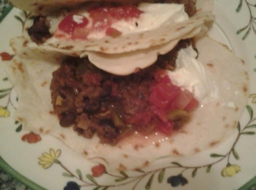 Black Bean toco sauce with ground beef added. Served with fresh flour tortillas