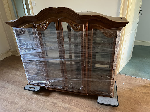 One of our recent moves where we used our reknowned care and expertise combined with specialist equipment to move a valuable and fragile antique glass display cabinet.