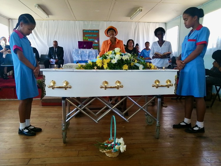 Classmates of Royden Plaatjies, who was nine years old when he was electrocuted by an illegal connection, pay their respects at his funeral at Soutpan Primary School, Port Elizabeth.