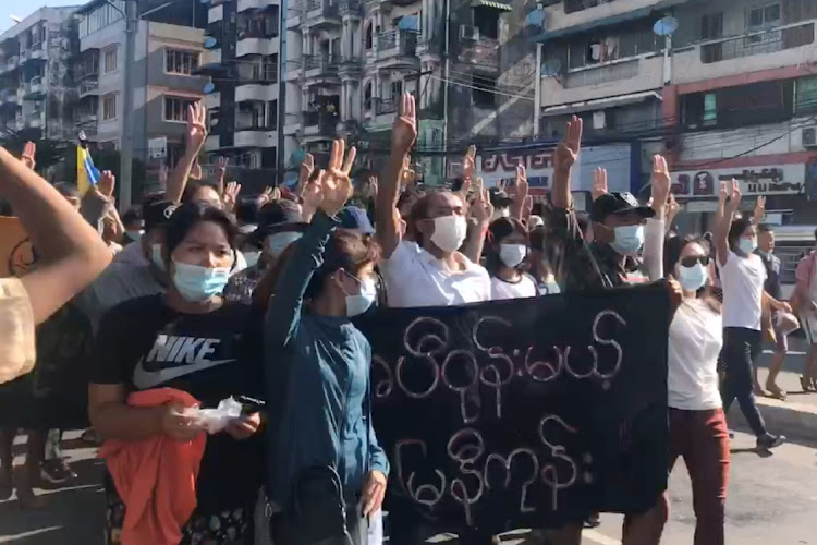 People protest in Hlaing Township, Yangon, Myanmar, on May 2 2021, in this still image from a video.