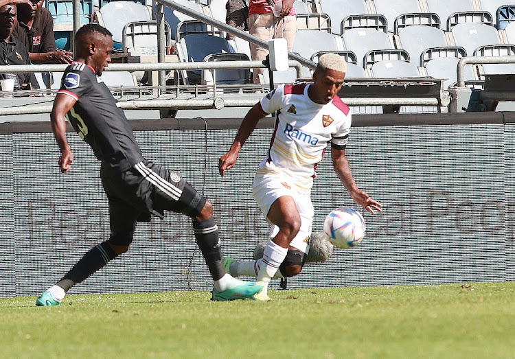 Innocent Maela of Pirates and Deano Van Rooyen of Stellenbosch during the DStv Premiership match between Orlando Pirates and Stellenbosch at Orlando Stadium, Soweto.