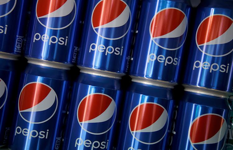 Cans of Pepsi are displayed in Paris, France. Picture: REUTERS/JACKY NAEGELEN