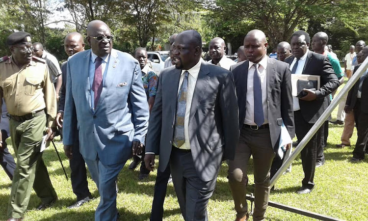 Education Cabinet Secretary George Magoha with Muhoroni MP Onyango Koyoo during the annual education retreat for national secondary schools and university students at the Chemelil Academy on Saturday, January 4, 2020