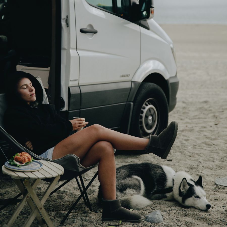 Woman and dog camping
