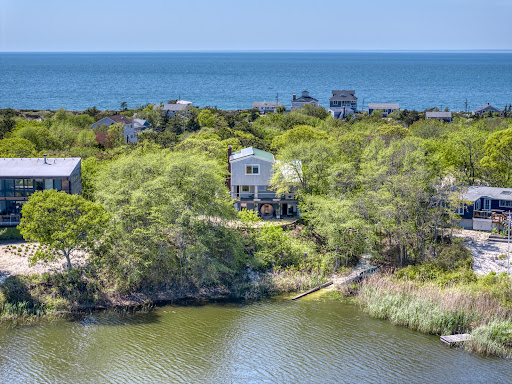 Coastal houses overlooking the ocean in this luxury house for rent in Southold ($20,000)