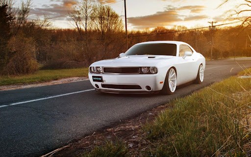 Sleek White Car Parked on a Serene Country screenshot 2