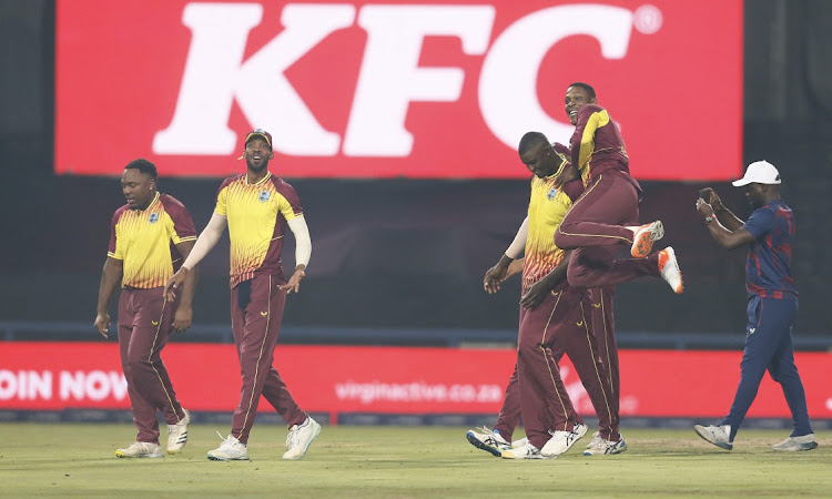 West Indies players celebrate their victory in the third T20 international against South Africa at the Wanderers on Tuesday.