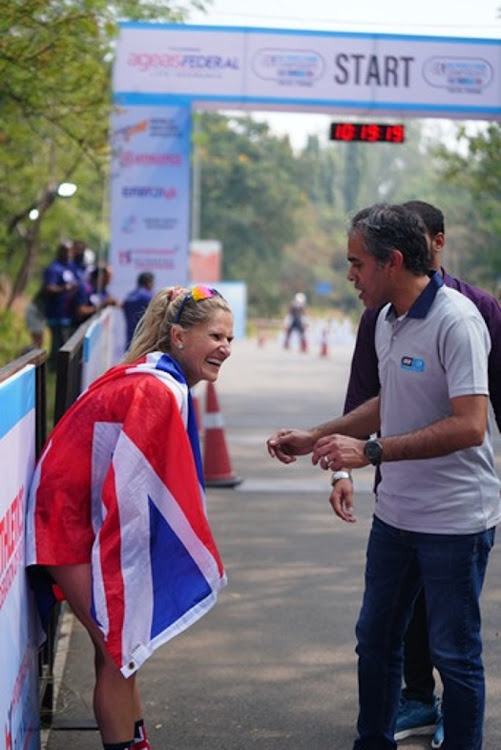 Carla Molinaro celebrates winning the IAU World 50km road running title in Hyderabad, India. Picture: ARUN KANNA FILMS