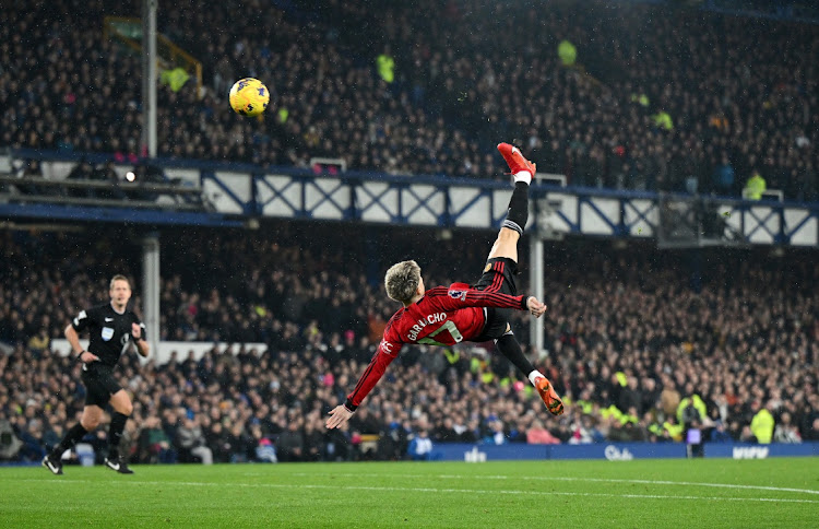 Alejandro Garnacho of Manchester United scores their first goal of their Premier League match against Everton and at Goodison Park in Liverpool on Sunday.