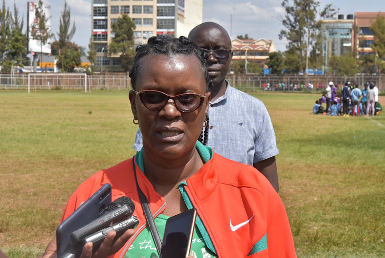 Kiambu Director of Vocational Training Emily Nkoroi addresses Journalists at Thika stadium on Friday