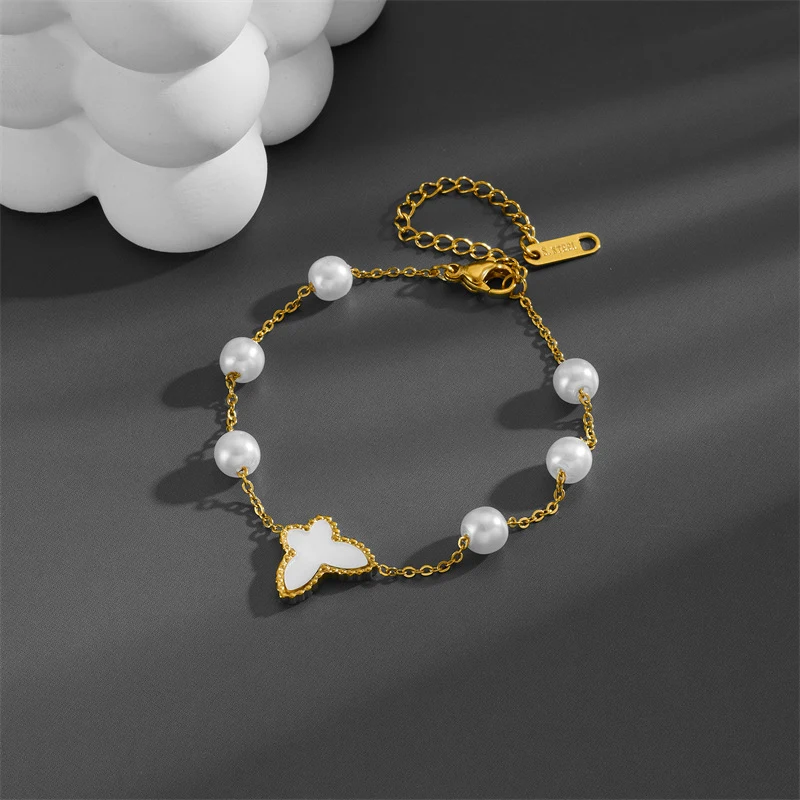 Pulsera para mujer con perlas de mariposa blanca simple, un accesorio elegante y delicado, ideal para realzar cualquier atuendo.