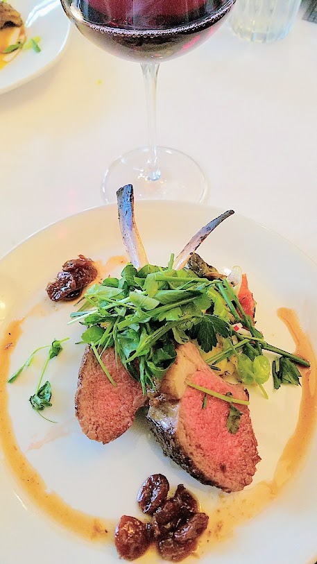 Jake's Grill and Anderson Ranches Lamb Pasture to Plate specials menu: a roasted rack of lamb with spring vegetables, washington cherry chutney, and mustard lamb demi-glace