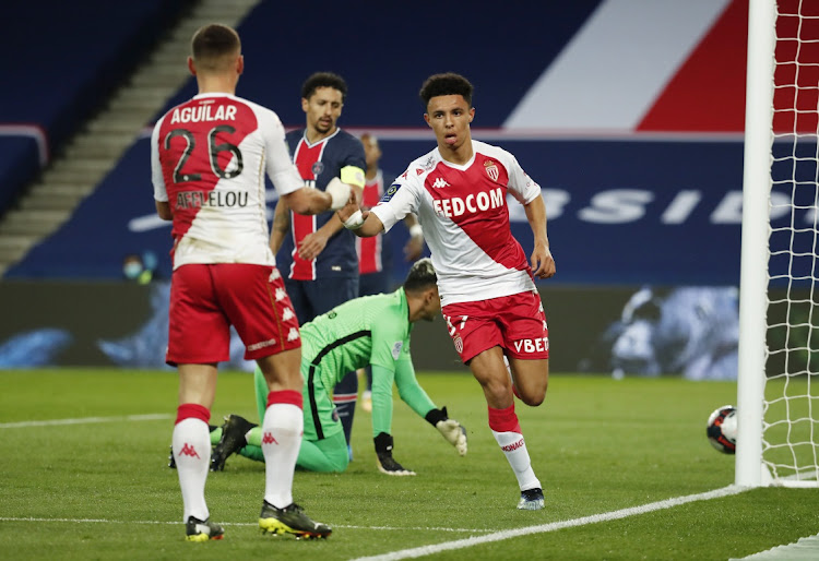 AS Monaco's Sofiane Diop celebrates scoring their first goal with Ruben Aguilar in their Ligue 1 fixture at Parc des Princes, Paris on February 21, 2021