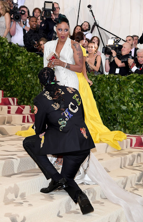 2Chainz proposes to Kesha Ward at Heavenly Bodies: Fashion & The Catholic Imagination Costume Institute Gala at the Metropolitan Museum of Art on May 7, 2018 in New York City.