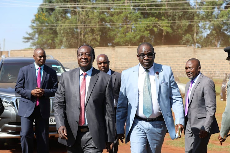 Governor Wilbe Ottichilo and Vihiga county secretary Ezekiel Ayiego at Kidundu Stadium.