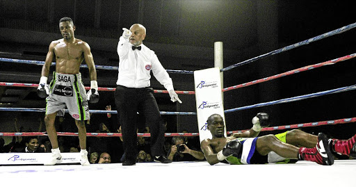 Emanny "The General" Kalombo after he landed a knockout blow to Nkululeko "Bull Dog" Mhlongo during their WBF Intercontinental junior middleweight fight at Edenvale Community Centre.