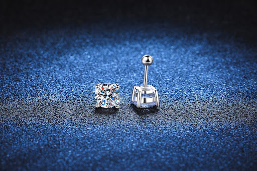 Title 2, Four-Claw Moissanite Sterling Silver Screw Stud...