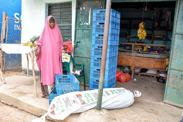 Ambia Hussein outside her shop in Garissa.