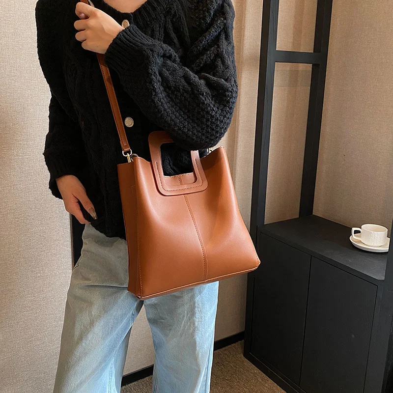 Bolso de mano tipo cubo de diseño minoritario para mujer, de alta calidad, nuevo y moderno, ideal para ir al trabajo.