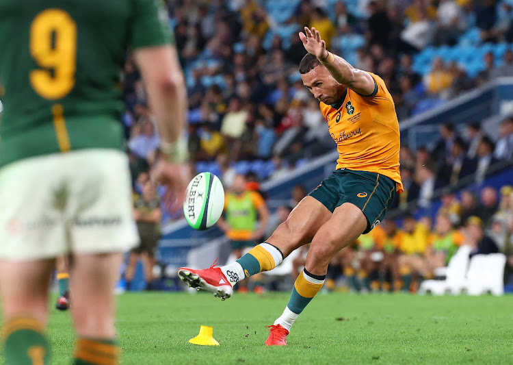 Australia's Quade Cooper kicking a penalty as he leads Australia to victory in the Rugby Championship match against South Africa at Cbus Super Stadium on the Gold Coast.