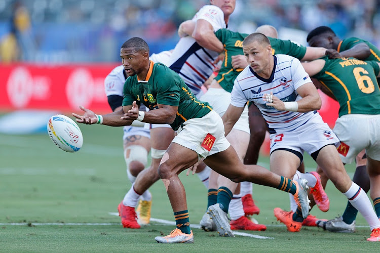 SA's Shaun Williams launches an attack against the USA at the Los Angeles Sevens at Dignity Health Sports Park.