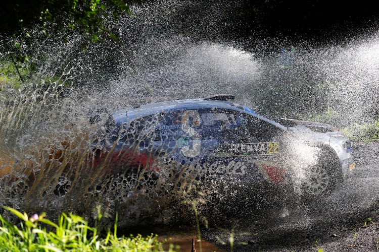 Sean Johnston navigated Alexander Kihurani driving Citroen C3 across a river at the Soysambu competitive section during the World Rally Championship in Naivasha. June 25, 2022.