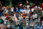 South Africa's Quinton de Kock walks after losing his wicket in the 2023 Cricket World Cup match against Bangladesh at Wankhede Stadium in Mumbai on Tuesday.