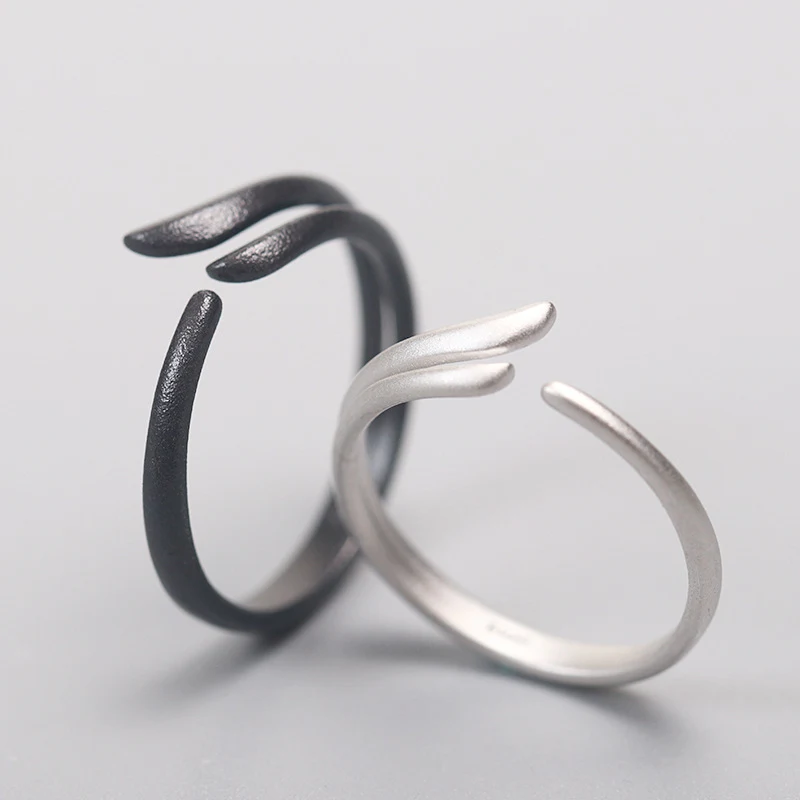 Title 3, Simple black and white wings couples ring, sym...
