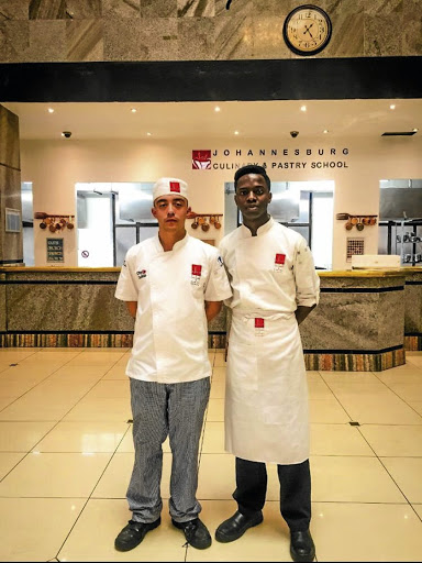 Student Mitchell Chan and lecturer Mashudu Masinya.