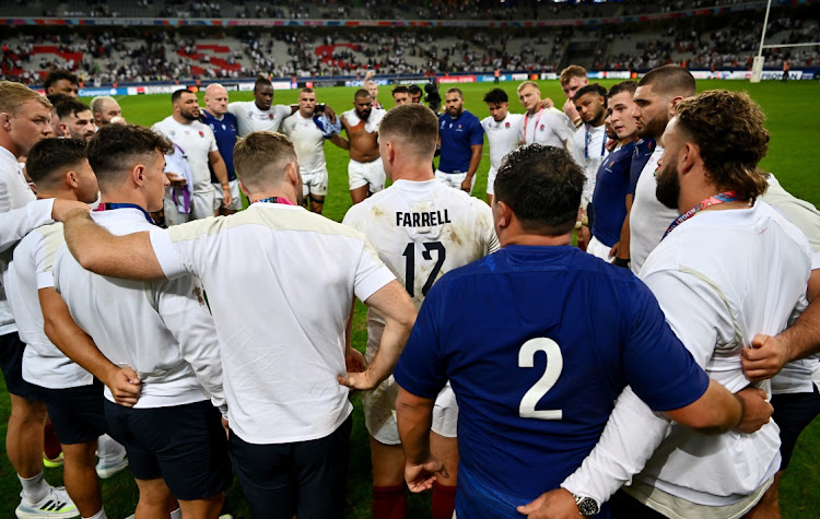 England captain Owen Farrell speaks the team huddle after beating Samoa in their Rugby World Cup match at Stade Pierre Mauroy in Lille, France on Saturday.