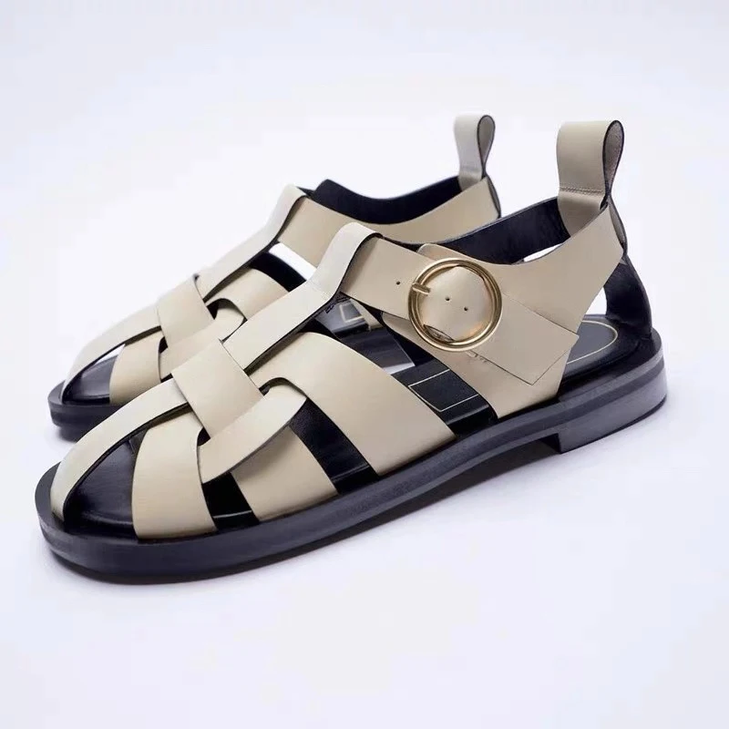 Women's casual round toe leather flat sandals, perfect for everyday wear. Comfortable and stylish footwear for a relaxed