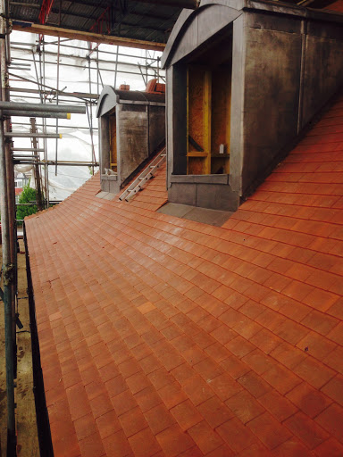 Plain tiles with code 5 lead dormers