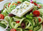 Spiralized Greek Cucumber Salad with Lemon and Feta was pinched from <a href="http://www.skinnytaste.com/2014/06/spiralized-greek-cucumber-salad-with.html" target="_blank">www.skinnytaste.com.</a>