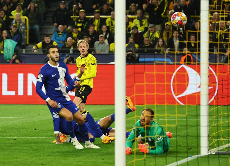 Julian Brandt scores Borussia Dortmund's first goal in their Uefa Champions League quarterfinal second leg match against Atletico Madrid at Signal Iduna Park in Dortmund, Germany on Tuesday night.