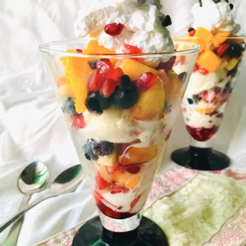 Fresh Fruit Salad With Cream And Ice Cream