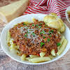 Thumbnail For A Bowl Of Amazing Bolognese With Garlic Knot.